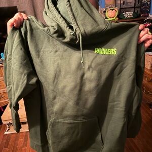 NFL Team Apparel Dark Green Pullover Hoodie with Embroidered Logo Tag